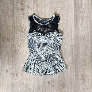 🎽 Geometric Peplum Top